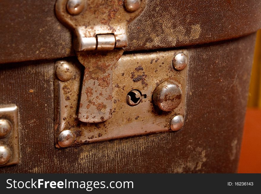 Vintage brown suitcase with open lock