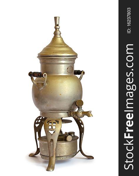 Antique coffeepot with spirit lamp isolated on a white background
