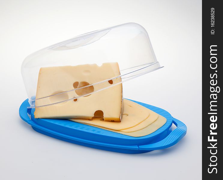Cheese in the butterdish on white background. Cheese in the butterdish on white background