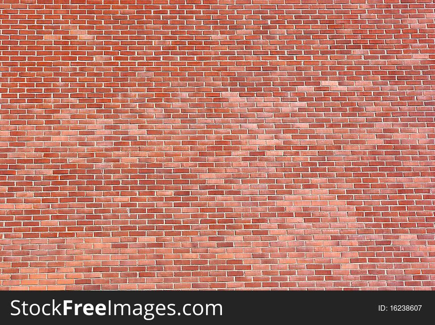 Adged brown brick wall texture. Adged brown brick wall texture