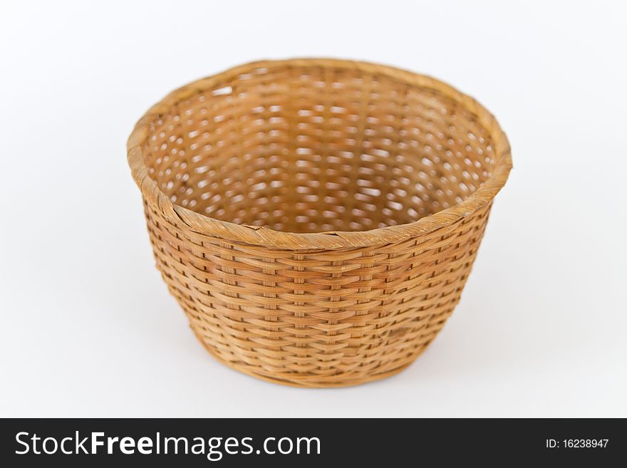 An empty basket on a white background