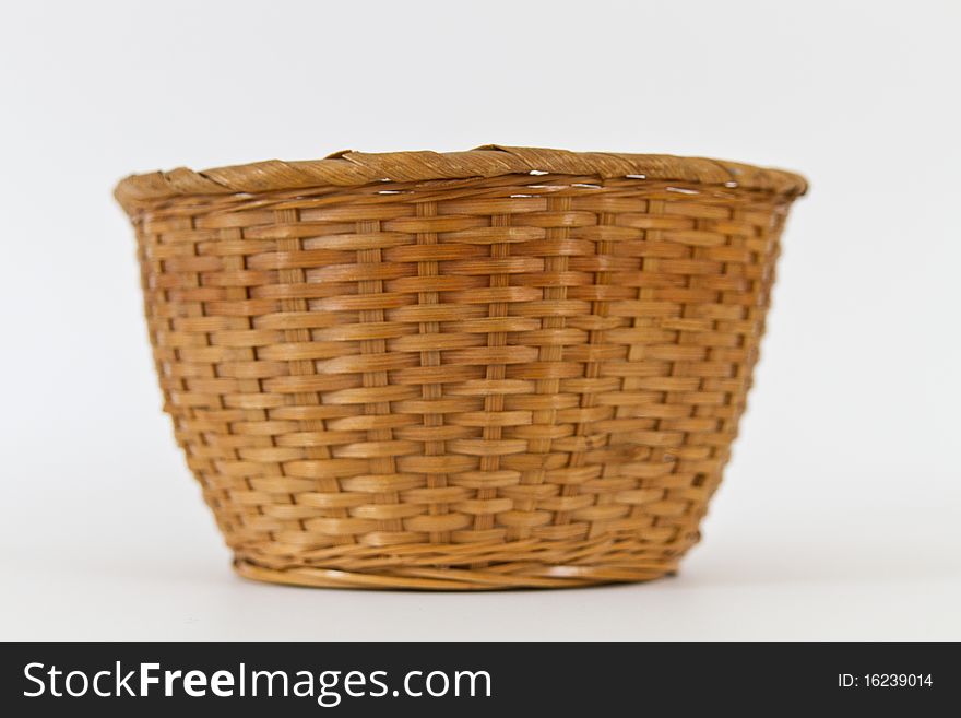 An empty basket on a white background