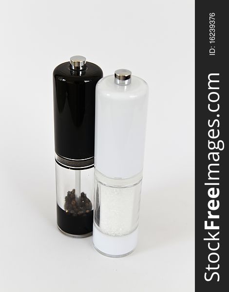 Salt and pepper shakers on a white background