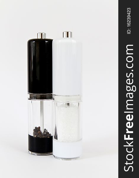 Salt and pepper shakers on a white background