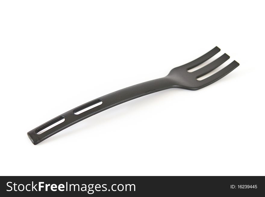 Black fork isolated on a white background