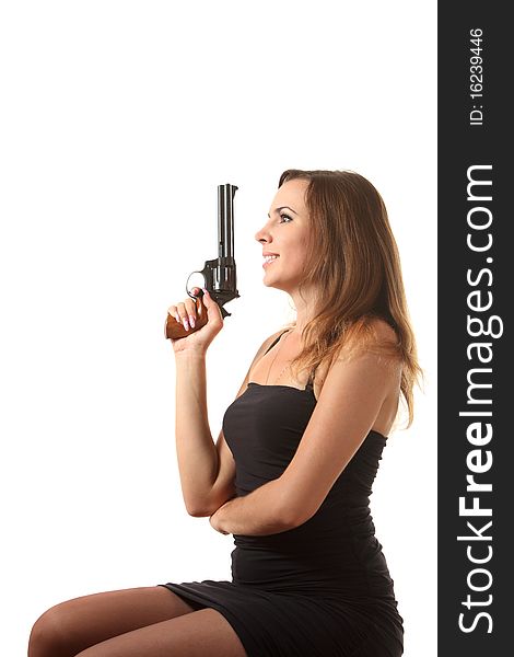 Girl is aiming a revolver