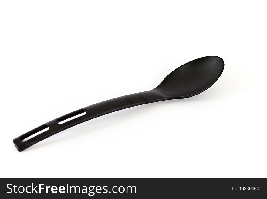 Black spoon isolated on a white background