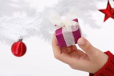 Hand Holding A Christmas Gift Stock Photos Hand Holding A Christmas Gift Stock Photos