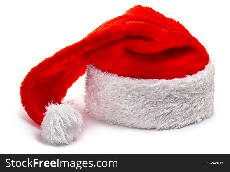 Santa Claus hat, lying on a white. Isolated on white.
