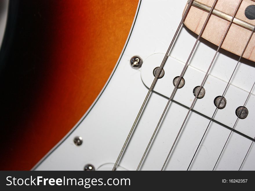 Close up of a Fender electric guitar. Close up of a Fender electric guitar.