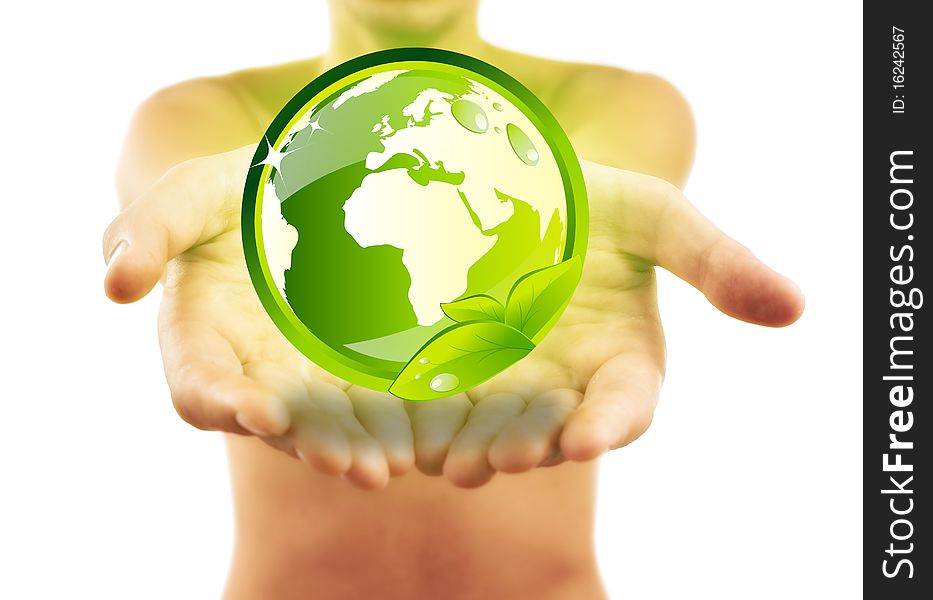 Hands holding earth with green leafs