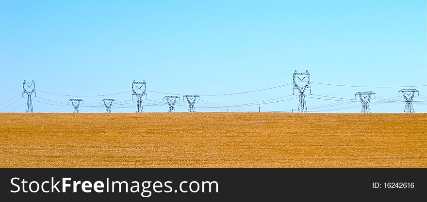 Wheat field of west united states, blue sky and iron titan. Wheat field of west united states, blue sky and iron titan