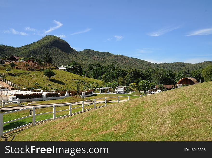 White fence in the hill