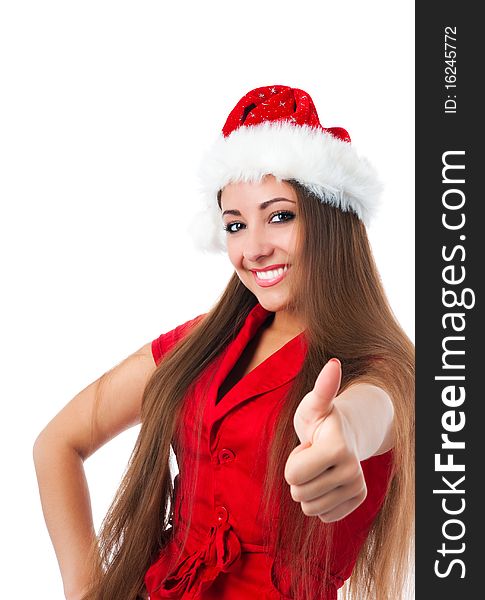 Attractive young women in santa claus hat show the thumb. Attractive young women in santa claus hat show the thumb