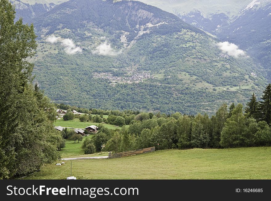 This image shows a forested landscape of La Vanoise National Park. This image shows a forested landscape of La Vanoise National Park