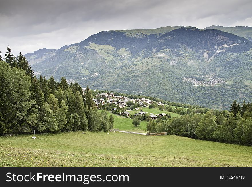 This image shows a forested landscape of La Vanoise National Park. This image shows a forested landscape of La Vanoise National Park