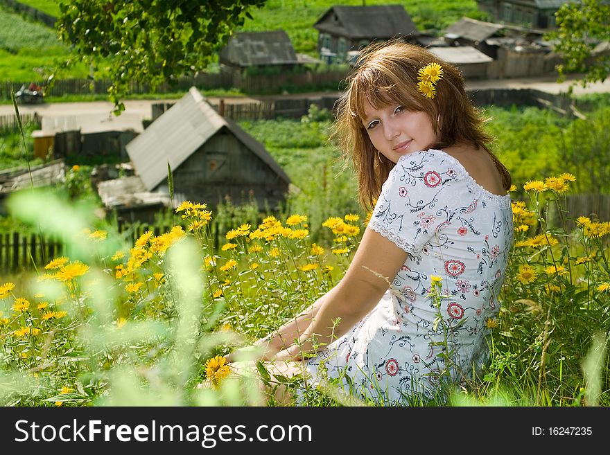 Girl with yellow flowers in hair. Girl with yellow flowers in hair