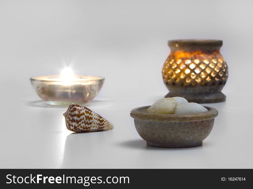 Candles, and stones, concept of,  wellness, zen, health and mental peace. Candles, and stones, concept of,  wellness, zen, health and mental peace