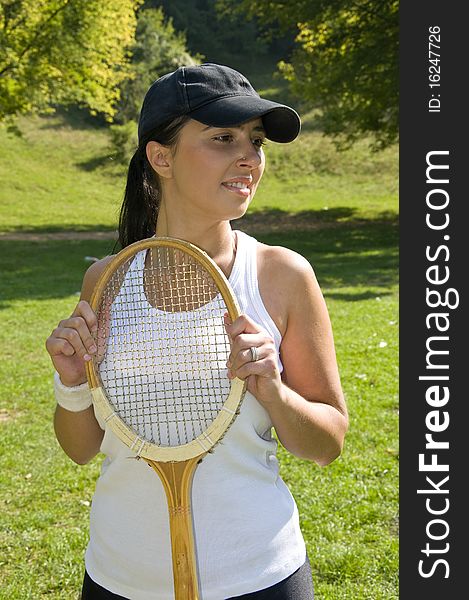 Cute girl is playing tennis