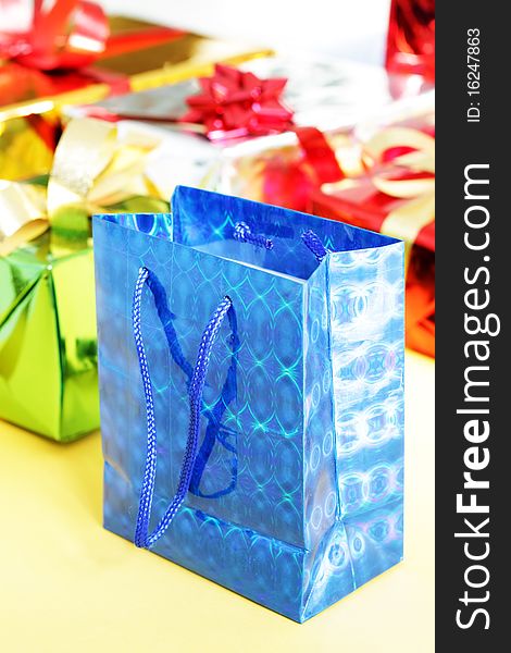 Several multi-colored gift boxes