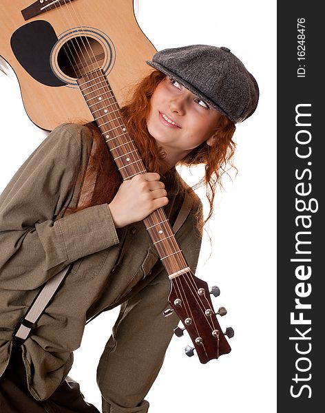 Nice young girl whith guitar on her shoulder