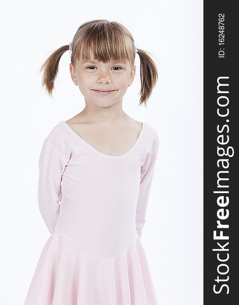 Smiling little girl with pigtails