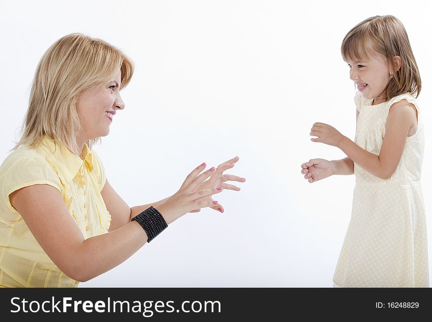 Portrait of two persons, beautiful mother and cute daughter ,having fun. Portrait of two persons, beautiful mother and cute daughter ,having fun