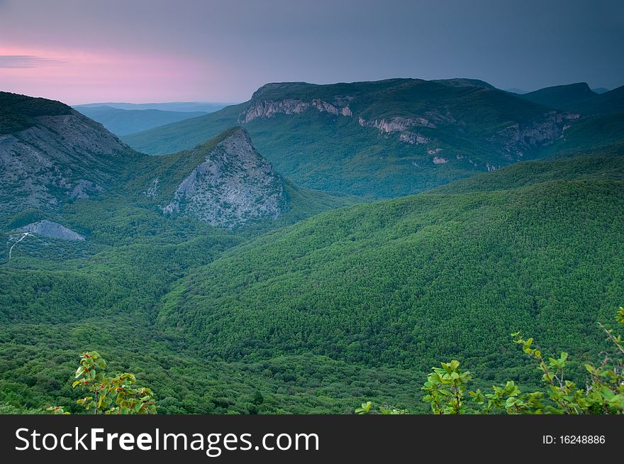 Pink sunset in high mountains