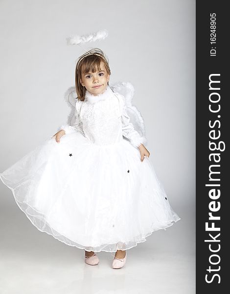 Adorable Girl In Angel Outfit With Wings And H