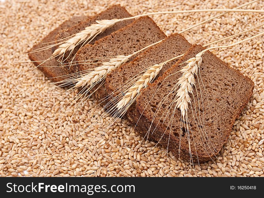 Sliced bread with ears on grain