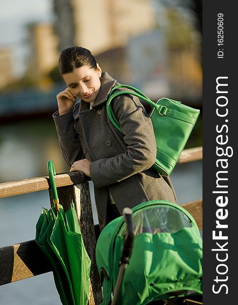 Mother with baby carriage, outdoors. Mother with baby carriage, outdoors