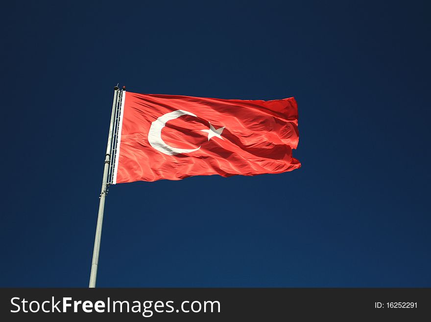 Turkish flag waving in a wind. Turkish flag waving in a wind.