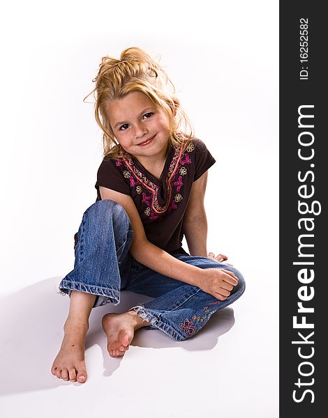 Full length shot of a beautiful young girl on a white background.