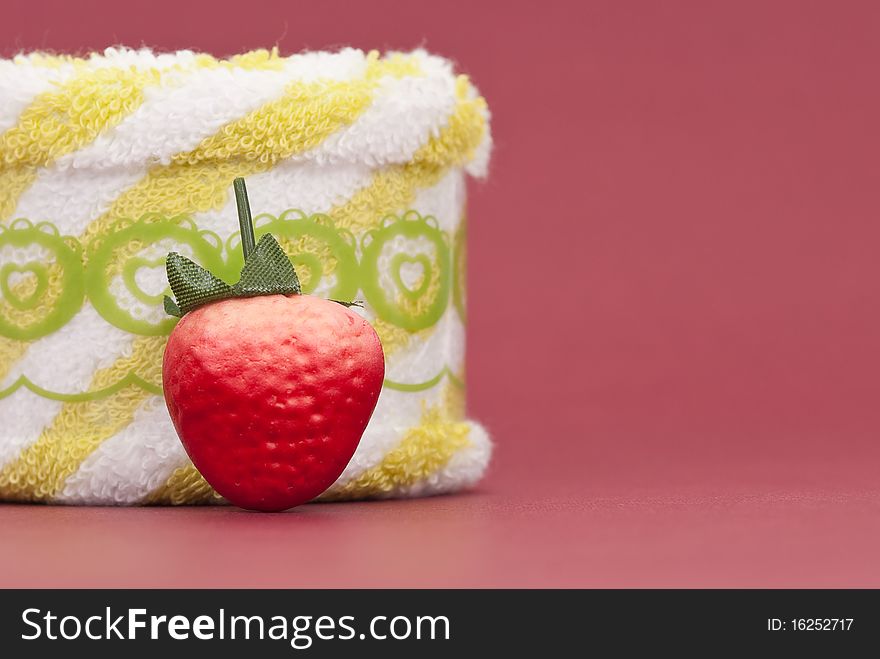 Fake Strawberry with Face Towel Roll. Fake Strawberry with Face Towel Roll