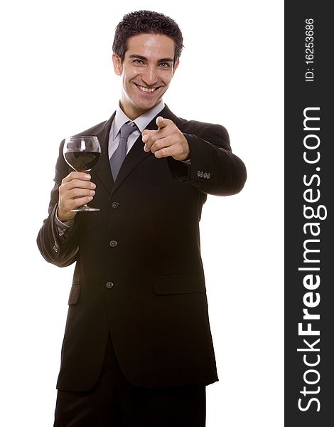 Businessman in suit celebrating his success with a glass of wine. Businessman in suit celebrating his success with a glass of wine