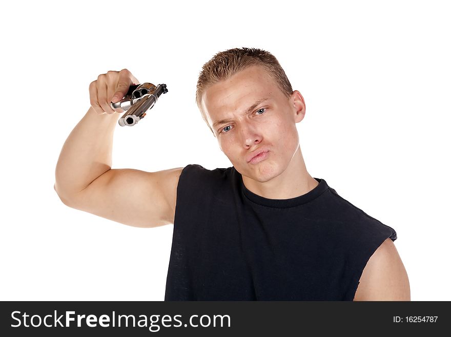 A young man holding a gun aimed at the camera with a serious expression on his face. A young man holding a gun aimed at the camera with a serious expression on his face.