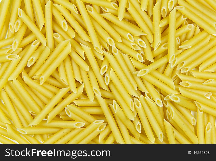 Closeup of uncooked italian pasta - penne. Closeup of uncooked italian pasta - penne