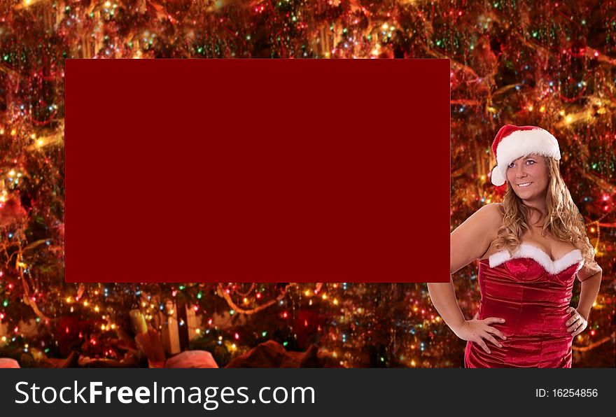 Christmas santa model with copy space for your own text.Background is a tree with lights. Christmas santa model with copy space for your own text.Background is a tree with lights