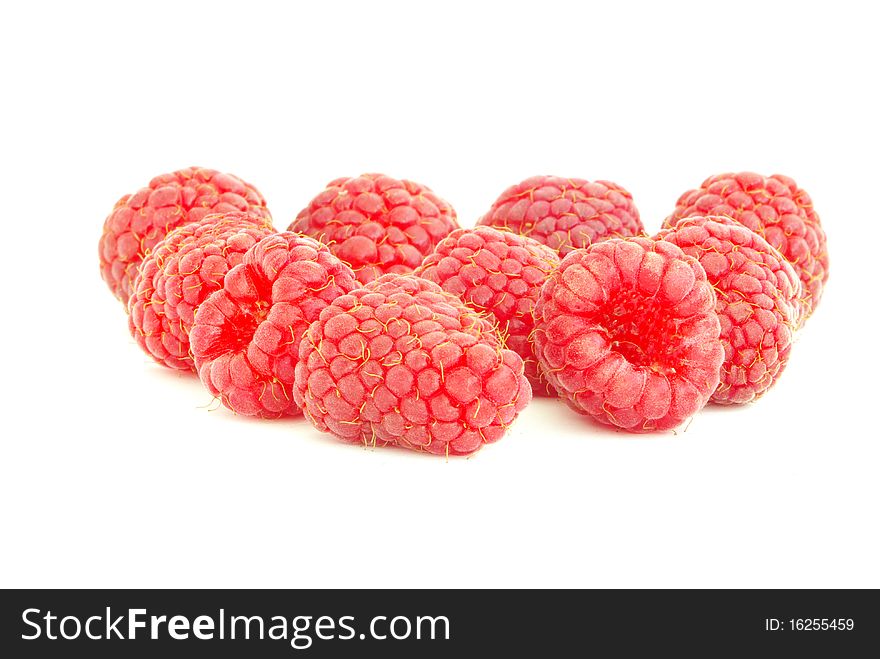 Ripe raspberry on a white background