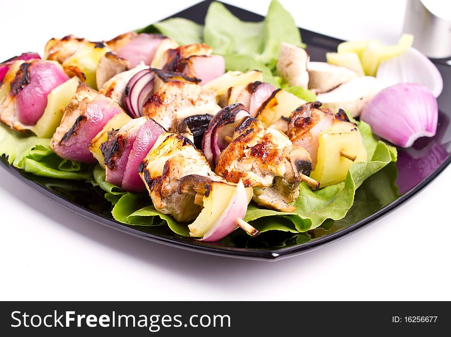 Cooked chicken and vegetables skewers. Cooked chicken and vegetables skewers