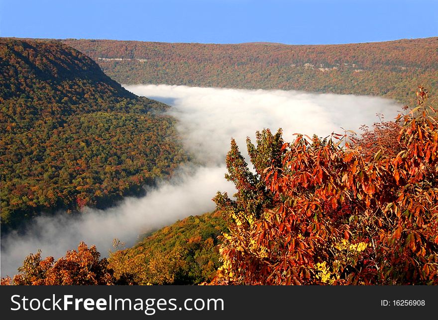 A temperature inversion causes dense fog to settle on the Tennessee River in east Tennessee, in autumn. A temperature inversion causes dense fog to settle on the Tennessee River in east Tennessee, in autumn