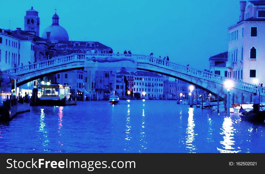 The water streets of Venice are canals which are navigated by gondola&#x27;s or other small boats. During daylight hours the canals, bridges, and streets of Venice are full of tourists eager to experience the romance of this great travel destination. As night engulfs the town, tourists enjoy some fine dining at one of the many restaurants, leaving the waterways and streets quiet. The water streets of Venice are canals which are navigated by gondola&#x27;s or other small boats. During daylight hours the canals, bridges, and streets of Venice are full of tourists eager to experience the romance of this great travel destination. As night engulfs the town, tourists enjoy some fine dining at one of the many restaurants, leaving the waterways and streets quiet.