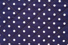 White Spots On Blue Cloth Stock Image