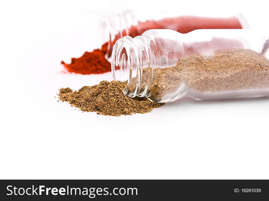 Close up shot of scattered paprika isolated on white