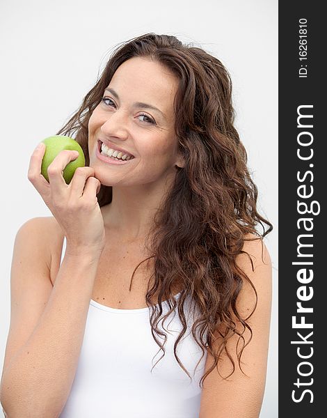 Closeup of woman eating a green apple. Closeup of woman eating a green apple
