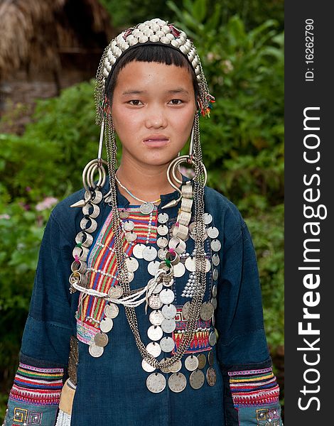 Portrait young Akha in Laos, woman with traditional clothes