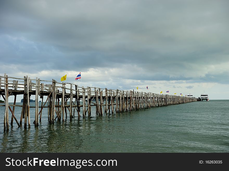 Wood bridge to the sea in South of Thailand