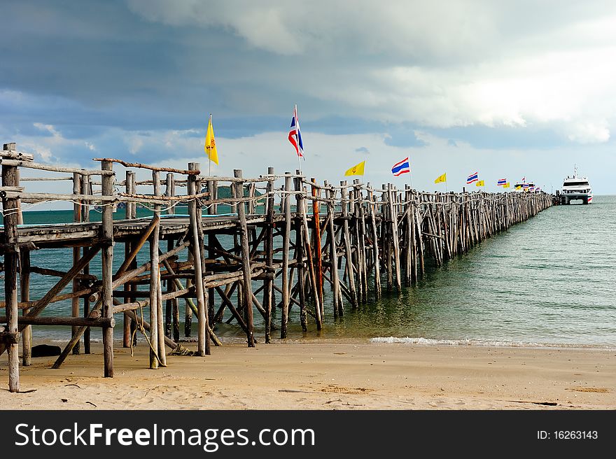 Wood bridge to the sea in South of Thailand