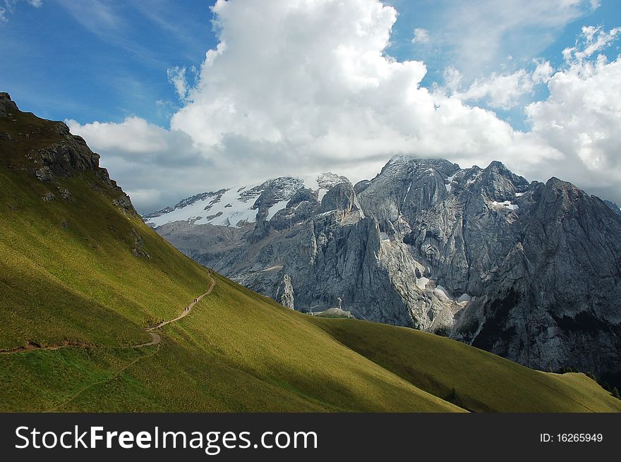 Mountain trek near Marmolada peak (3343m.) - highest point of Italian Dolomites. Mountain trek near Marmolada peak (3343m.) - highest point of Italian Dolomites.