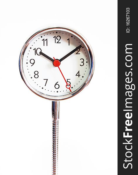 Modern table clock isolated on seamless white background